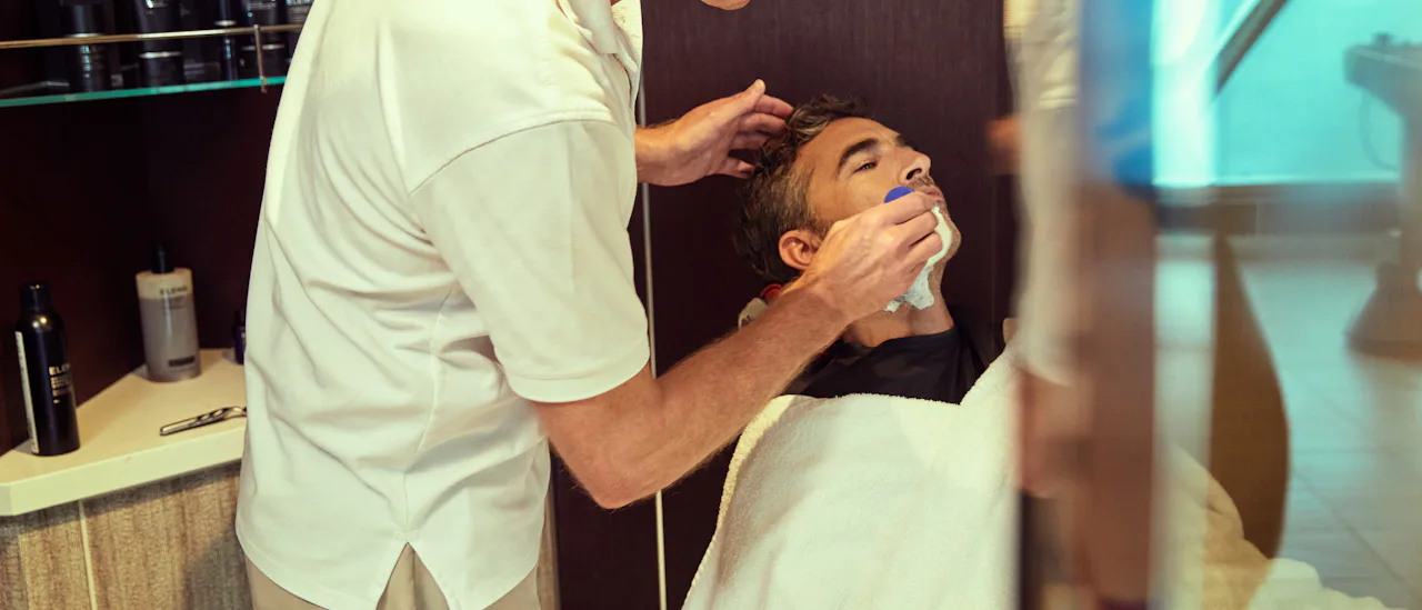 The ship’s barber is always ready to groom your beard
