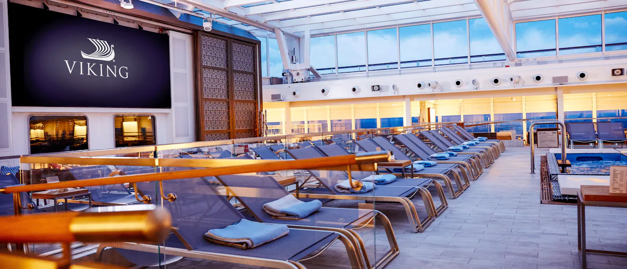 Comfortable lounge beds by the pool