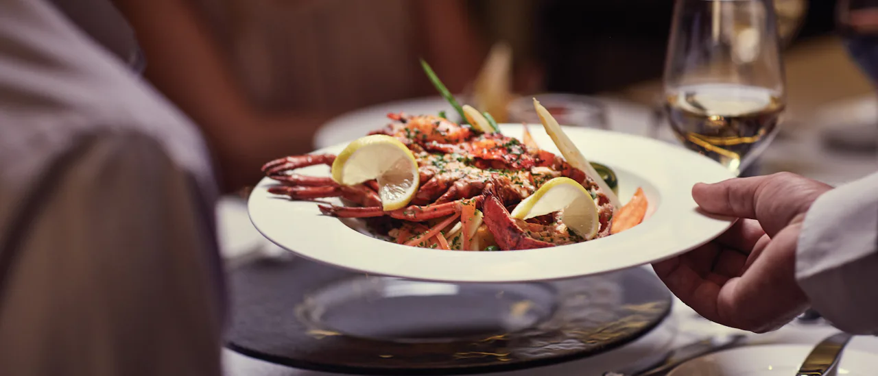 Delicious meals pared with wines selected by prize-winning expert Olly Smith at speciality restaurant The Glass House