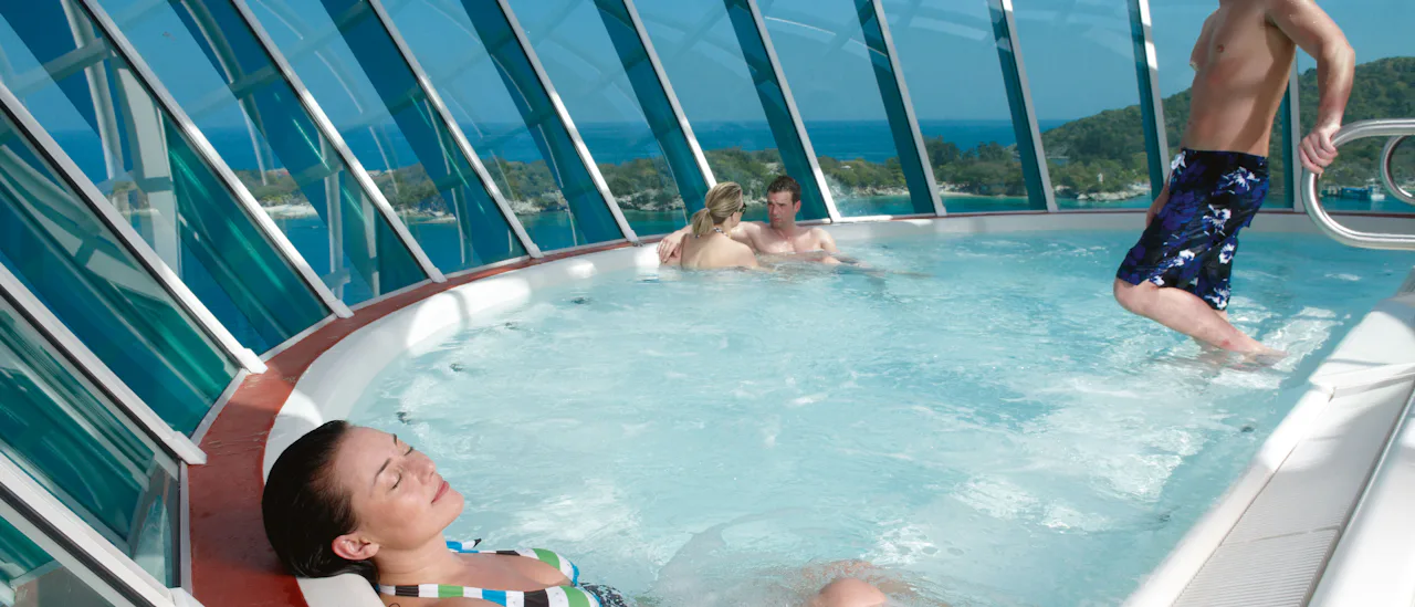 Relax in jacuzzi that hangs outside the ship, 120 feet above sea level.