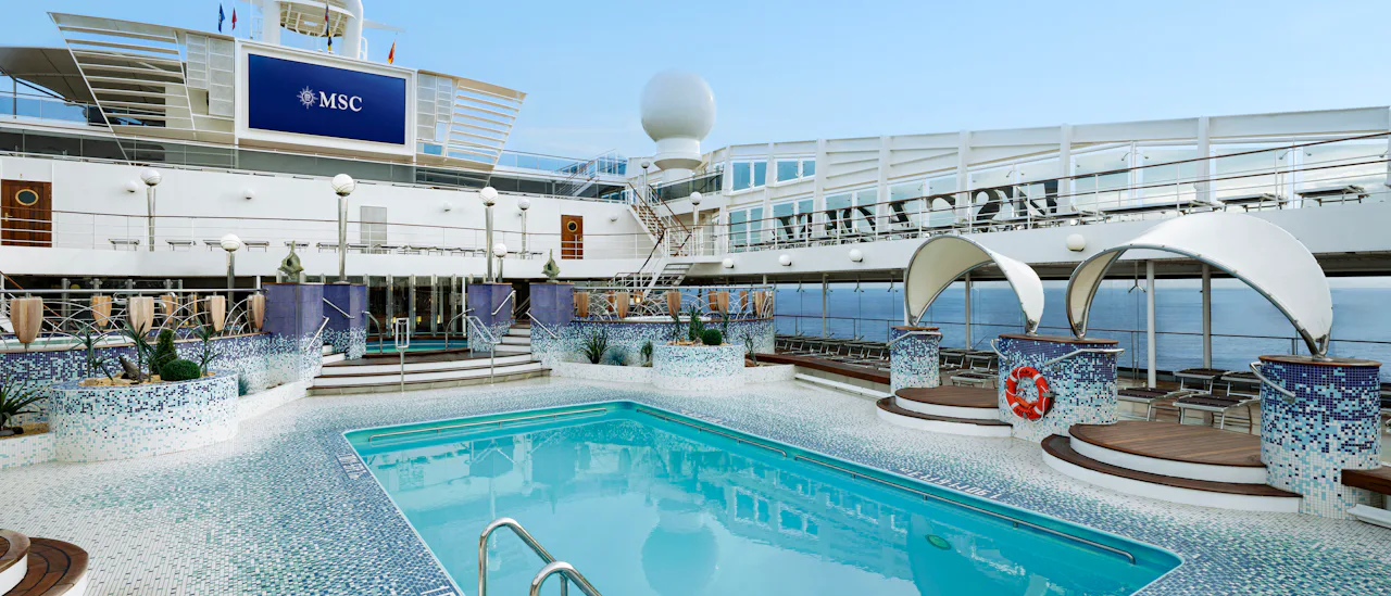 The Coral Bay Pool Area offers a swimming pool and poolside cinema, the perfect spot to relax and enjoy outdoor entertainment