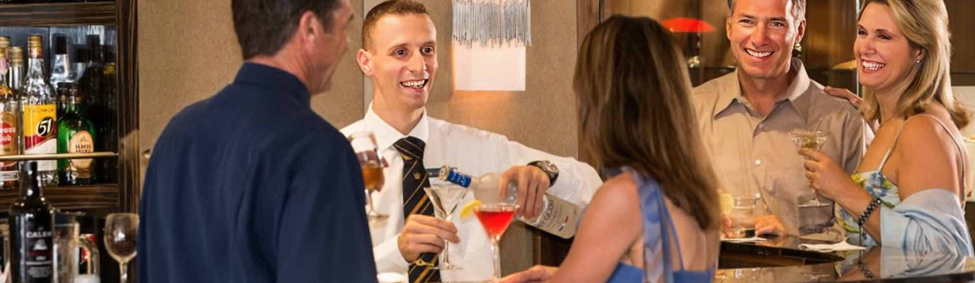People enjoying drinks on board a river cruise