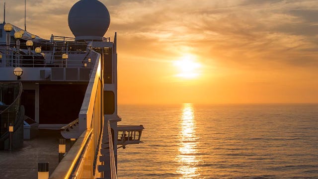 MSC Preziosa sailing at sunset