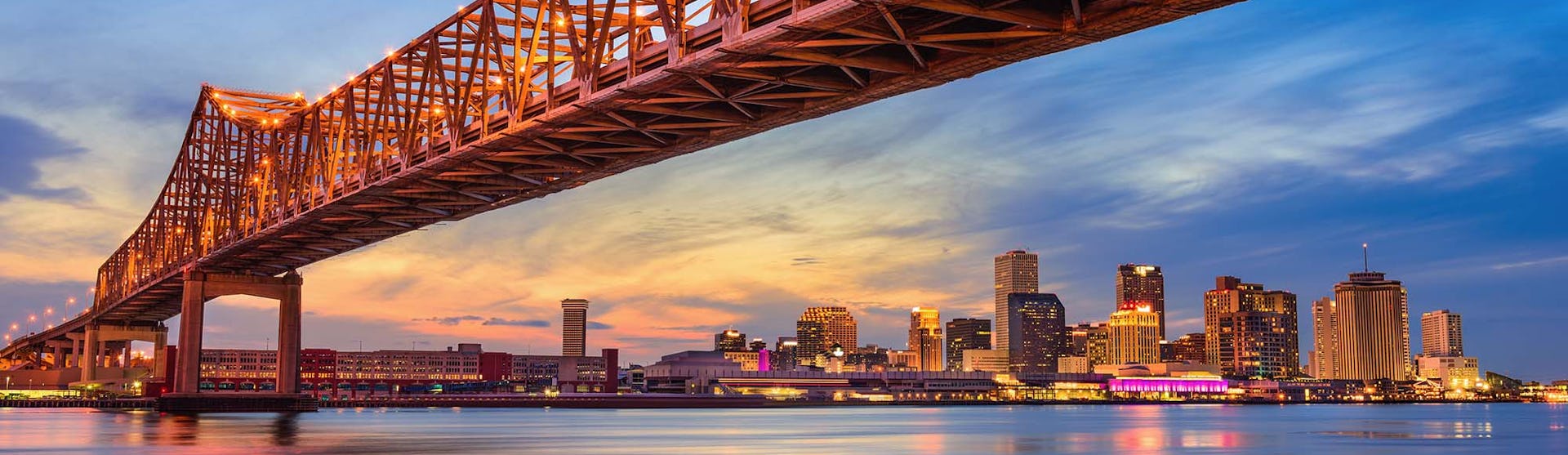 New Orleans, Louisiana, USA at Crescent City Connection Bridge over the Mississippi River.